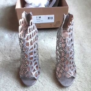 Zigi soho  4 1/2 Inch Women Cutout Silver Pumps With Rhinestones.